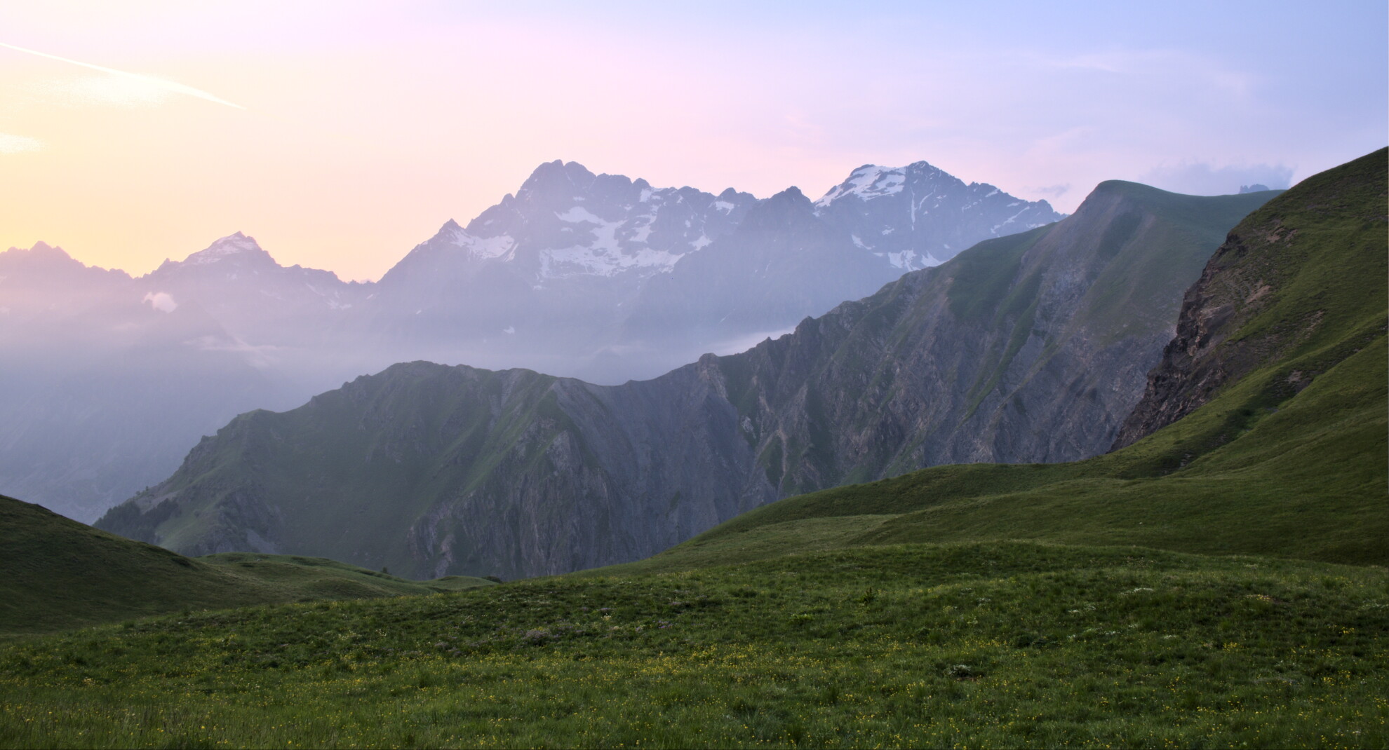 Sunset at alpine pasture trek in Écrins
