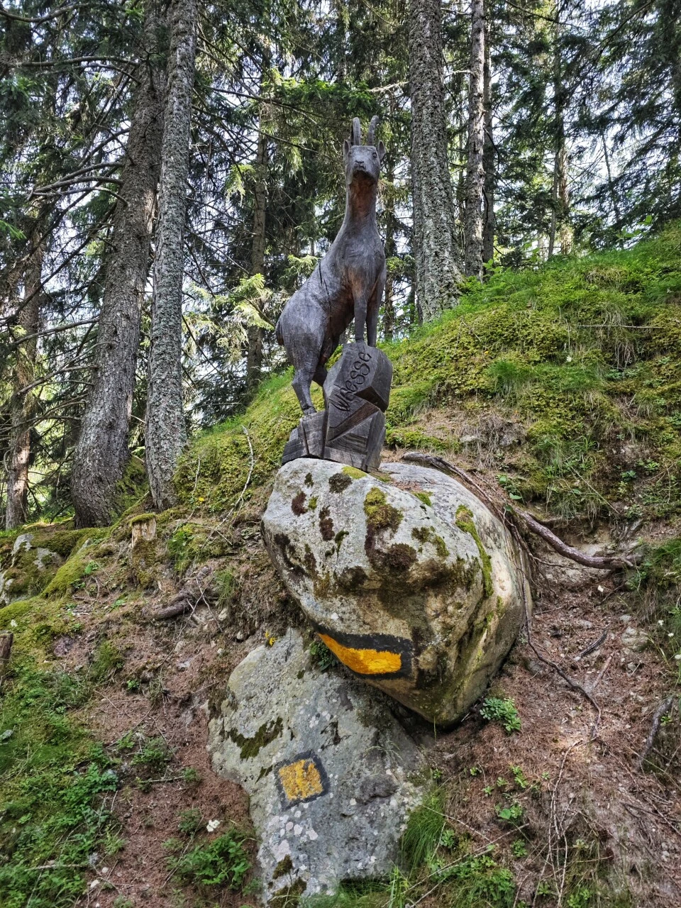 Chamois sculpture on the trail between Praz-de-Fort and Champex